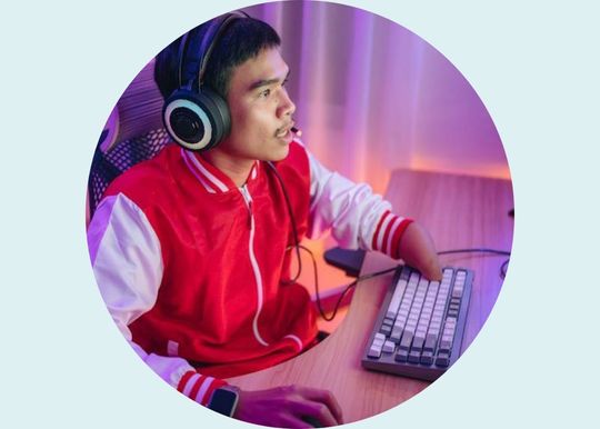 1 Male gamer intensely playing online games, illustrating gaming addiction for a behavioral health disorders